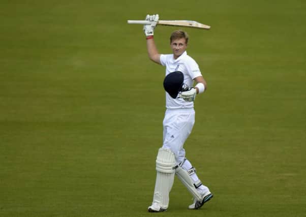 Joe Root celebrates after scoring 200 not out, his highest Test score.  Picture: Reuters