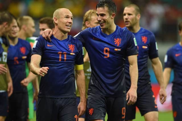 Arjen Robben and Robin van Persie walk off the pitch satisfied with a brilliant nights work. Picture: Getty