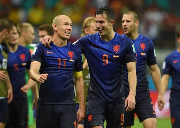 Arjen Robben and Robin van Persie walk off the pitch satisfied with a brilliant nights work. Picture: Getty