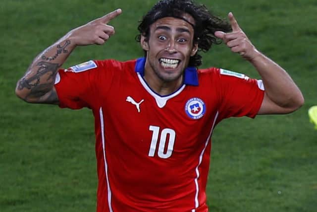 Chile's Jorge Valdivia celebrates scoring against Australia. Picture: Reuters