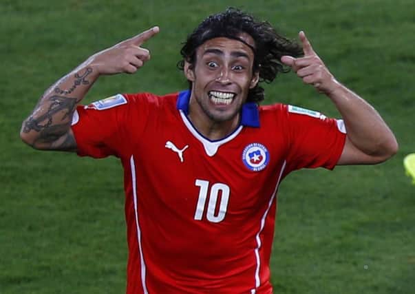 Chile's Jorge Valdivia celebrates scoring against Australia. Picture: Reuters