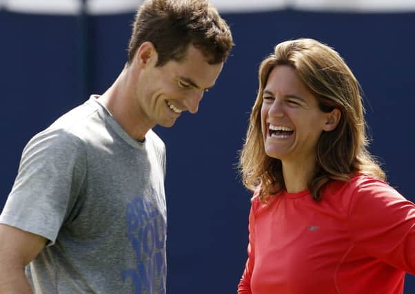 Andy Murray with coach Amelie Mauresmo at the Queens Club in London. Picture: Reuters