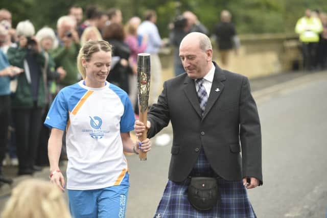 Michael Cavanagh (right), Chairman Commonwealth Games Scotland, on the bridge at Coldstream.