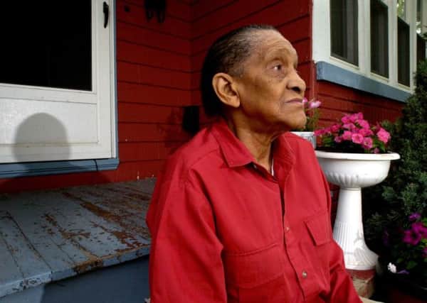 Jazz legend Jimmy Scott poses for a portrait at his home in Euclid, Ohio in 2004. Picture: AP