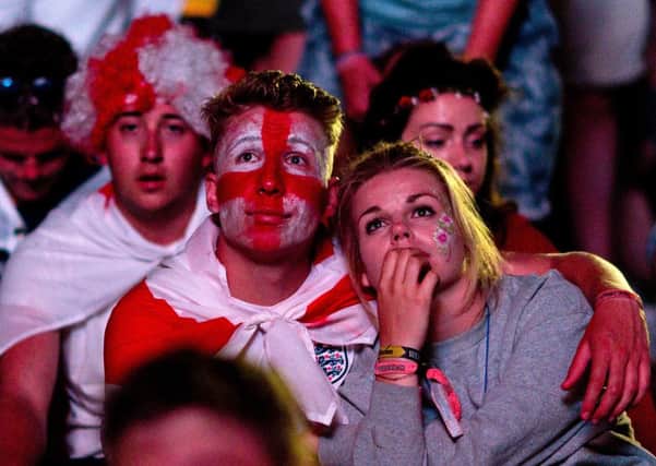 England fans get into their national colours for their match against Italy. Picture: Getty