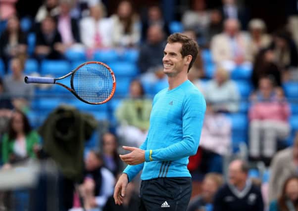 Andy Murray has a laugh during the rally for Bally exhibition match. Picture: PA