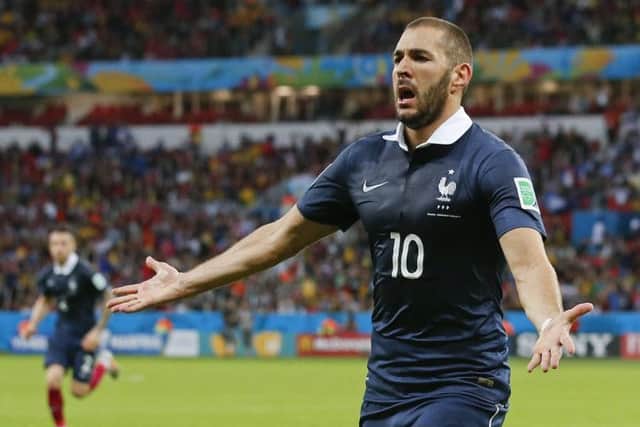 France's Karim Benzema celebrates after scoring his side's third goal. Picture: AP
