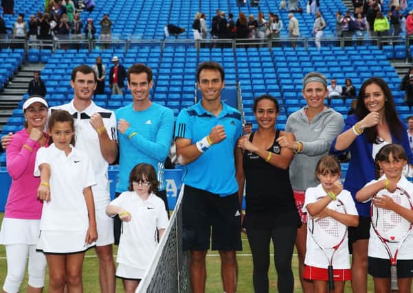 Tennis stars in attendance show off their 'Rally for Bally' wristbands. Picture: Getty
