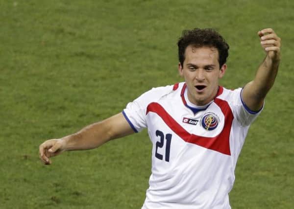 The much-maligned Marco Urena scored Costa Rica's third in a shock 3-1 win over Uruguay. Picture: AP