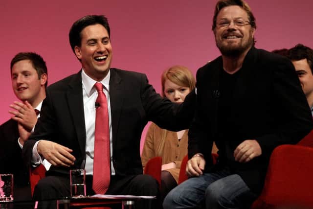 Izzard, right, with Ed Miliband. Picture: Getty