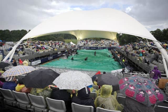 Rain stopped play during the match between John McEnroe and Mikael Pernfors at the tournament last year. Picture: TSPL