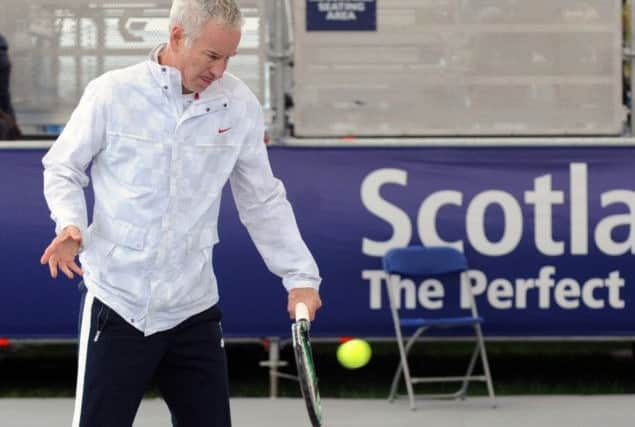 John McEnroe warms up before his match last year. Picture: TSPL