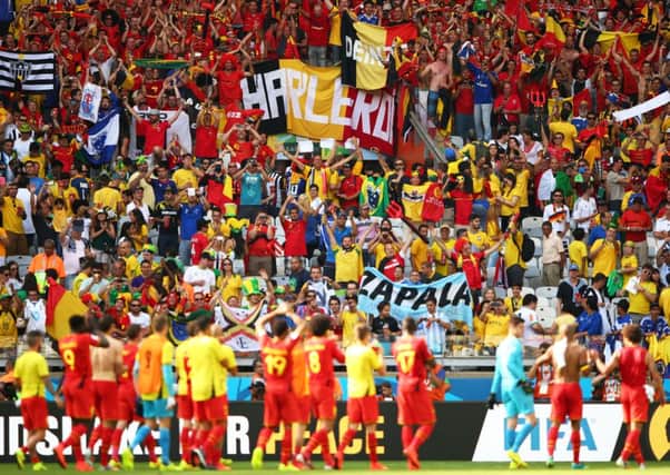 Belgium acknowledge their cheering fans after defeating Algeria 2-1. Picture: Getty