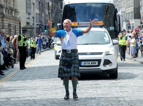Crowds came out for the Queens Baton Relay in Edinburgh. Picture: Lisa Ferguson