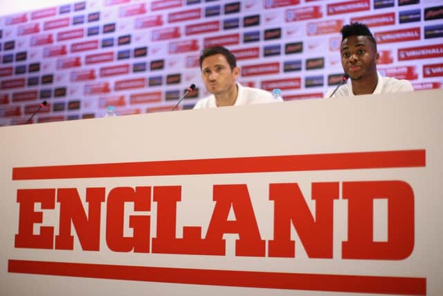 England vice-captain Frank Lampard, left, and forward Raheem Sterling face the press yesterday. Picture: Getty