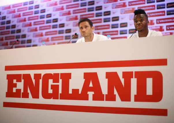 England vice-captain Frank Lampard, left, and forward Raheem Sterling face the press yesterday. Picture: Getty