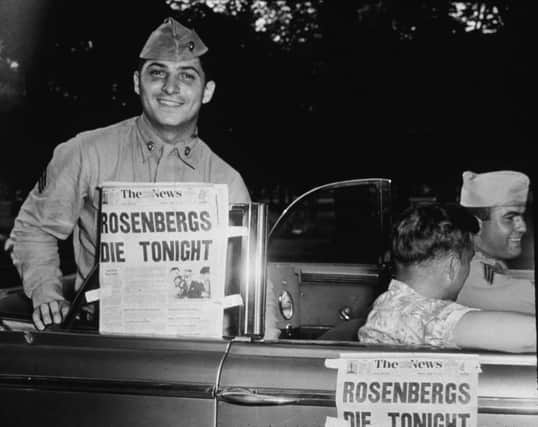 American soldiers celebrate the impending executions of Julius and Ethel Rosenberg for espionage on this day in 1953. Picture: Getty