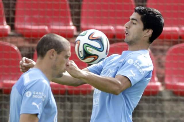 Uruguays Luis Suarez trains with his team at Arena do Jacare Stadium in Sete Lagoas. Picture: AP