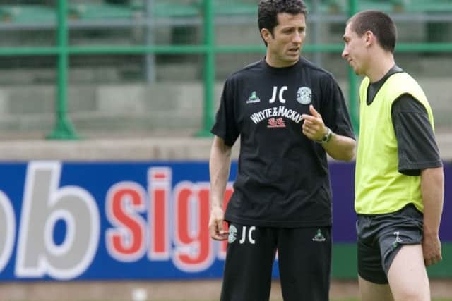 John Collins chats with Scott Brown during their time at Hibs. Picture: TSPL