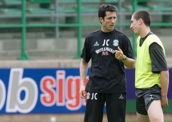 John Collins chats with Scott Brown during their time at Hibs. Picture: TSPL
