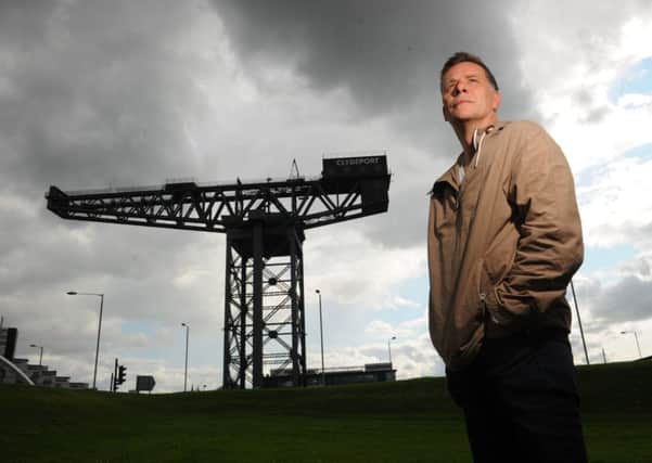 Deacon Blue singer Ricky Ross photographed in front of the Finnieston Crane. Picture: Robert Perry