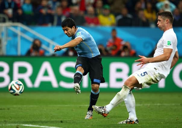 Luis Suarez scores Uruguay's second goal. Picture: Getty
