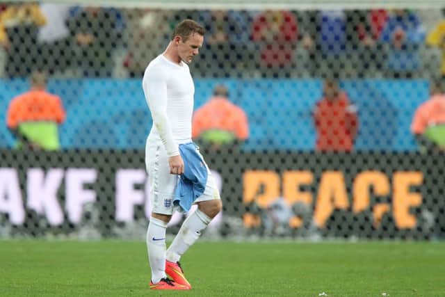 Wayne Rooney, who scored England's goal, walks off dejected. Picture: PA