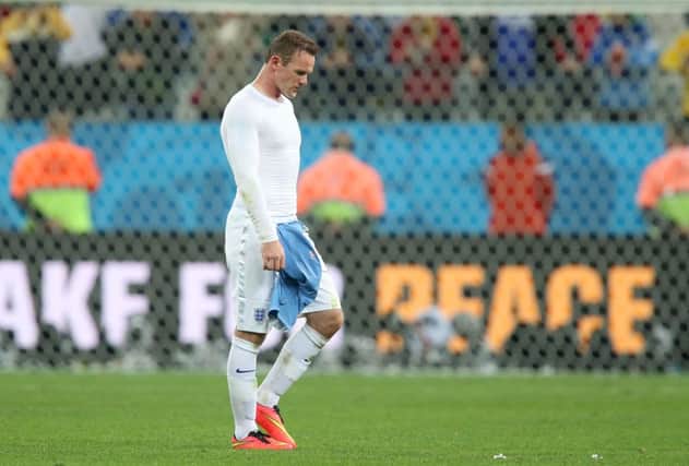 Wayne Rooney, who scored England's goal, walks off dejected. Picture: PA