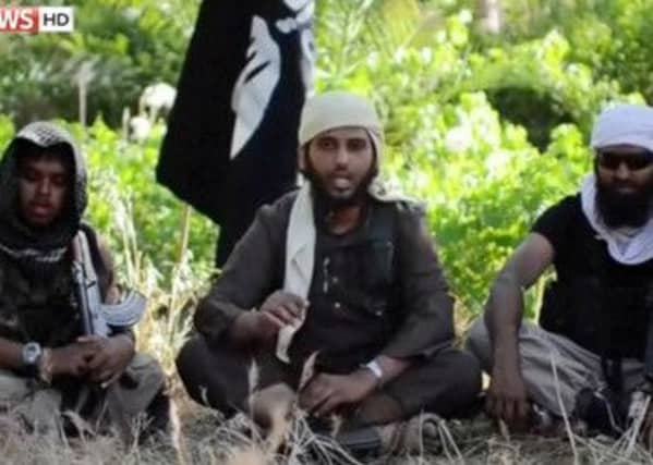 A video purporting to show British jihadists urging Western Muslims to join. Picture: Sky News