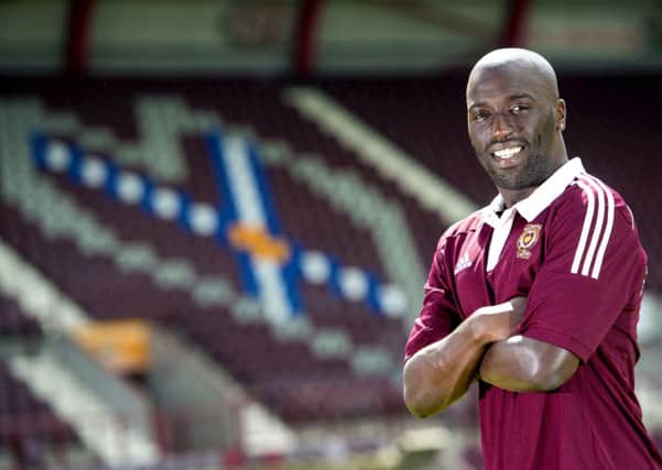 Morgaro Gomis speaks to the press as he is announced as Hearts' most recent signing. Picture: SNS