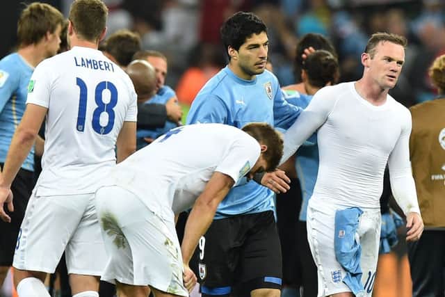 Englands players were left crestfallen after Luis Suarezs double for Uruguay on Thursday. Picture: PA