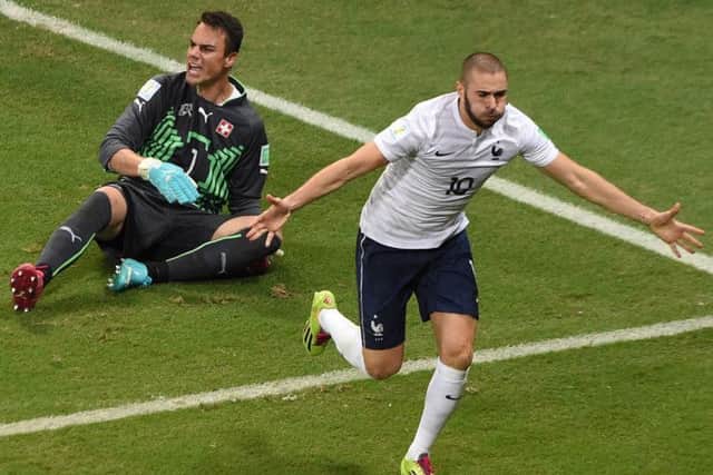 France striker Karim Benzema celebrates after scoring his sides fourth goal against Switzerland. Picture: Getty