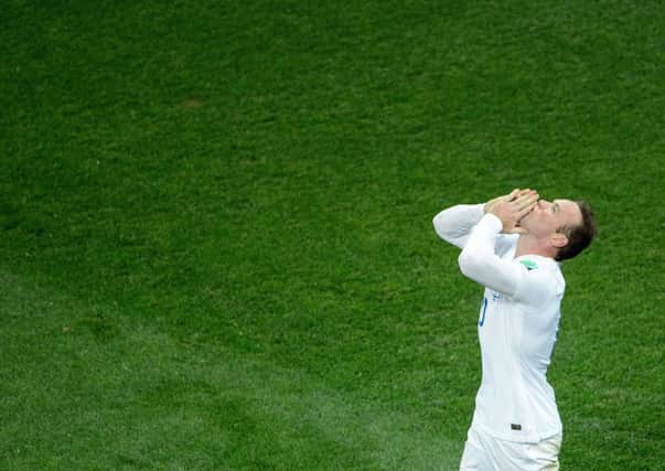 Wayne Rooney celebrates scoring his first World Cup goal during England's clash with Uruguay. Picture: Getty