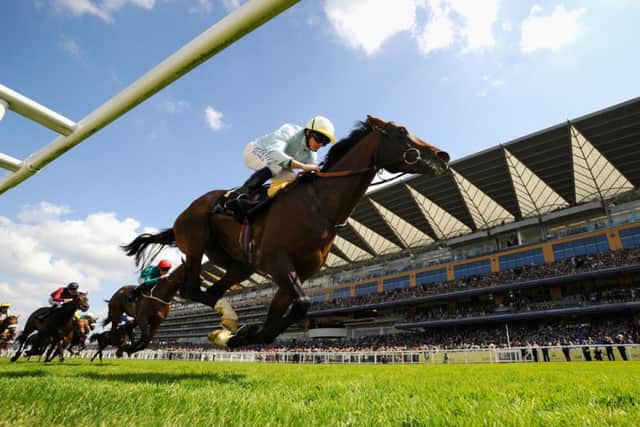 Jockey Ryan Moore rides Arab Spring to victory at Royal Ascot. Picture: Alan Crowhurst
