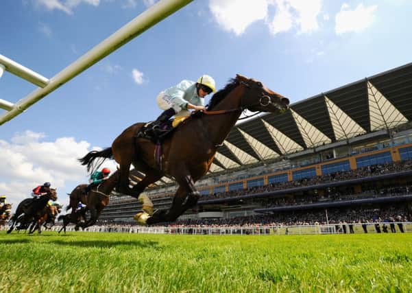 Jockey Ryan Moore rides Arab Spring to victory at Royal Ascot. Picture: Alan Crowhurst
