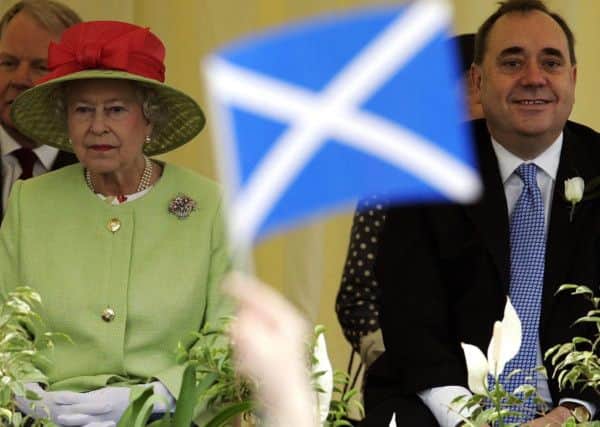 The Queen with First Minister Alex Salmond. Picture: PA