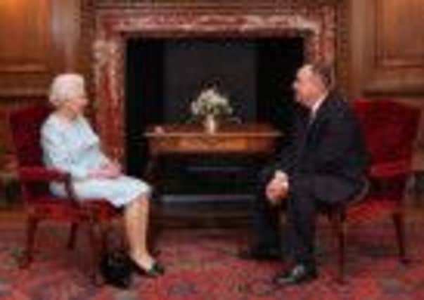 Queen Elizabeth talks to the Scottish First minister Alex Salmond. Picture: PA