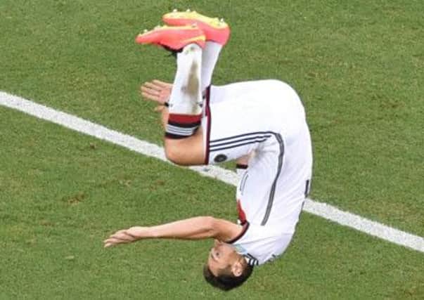 Germany's Miroslav Klose celebrates the goal which equals Ronaldo's World Cup record. Picture: Reuters