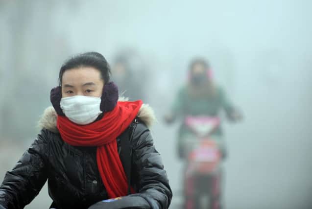 Smog is caused by stagnation in the air mass. Picture: AFP