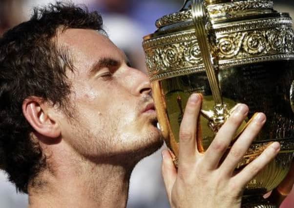 Andy Murray kissing the trophy last year. Picture: AP