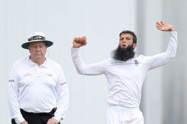Englands off-spinning all-rounder, Moeen Ali, took two quick wickets at a crucial time. Picture: PA