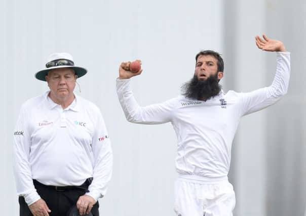 Englands off-spinning all-rounder, Moeen Ali, took two quick wickets at a crucial time. Picture: PA