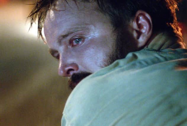 Aaron Paul plays a widowed father of two boys