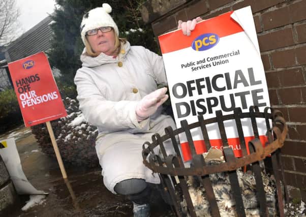 Staff are planning strikes like the pickets at HMRC tax office near Cumbernauld Town Centre last year. Picture: TSPL