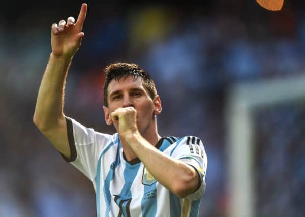 Argentine striker Lionel Messi celebrates his goal against Iran during their World Cup match. Picture: Getty