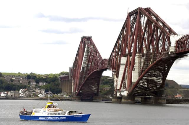 The Forth Belle sails under the Forth Bridge. Picture: Kenny Smith
