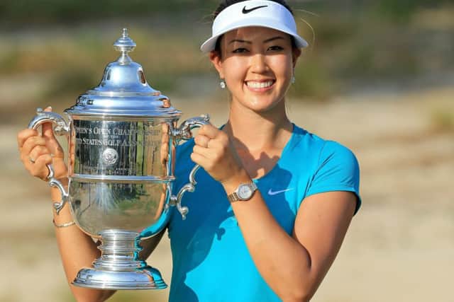 Michelle Wie shows off the US Open trophy she won at Pinehurst. Picture: Getty