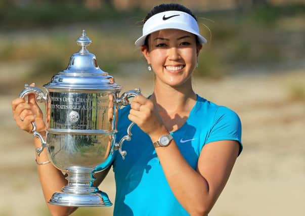 Michelle Wie shows off the US Open trophy she won at Pinehurst. Picture: Getty