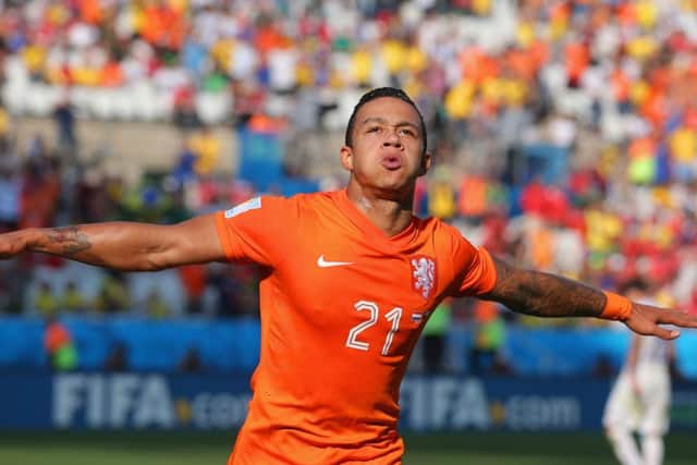 Memphis Depay of the Netherlands celebrates scoring his team's second goal against Chile. Picture: Getty