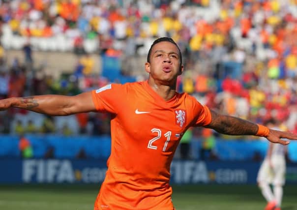 Memphis Depay of the Netherlands celebrates scoring his team's second goal against Chile. Picture: Getty